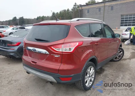 2015 Ford Escape Titanium z USA, uszkodzony, nr VIN 1FMCU9J97FUC14886